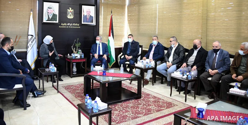 Palestinian Prime Minister Mohammed Ishtayeh meets with Dr. Laila Ghanem, in the West Bank city of Ramallah on March 6, 2021. Photo by Prime Minister Office