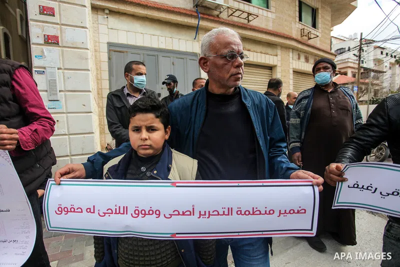 Refugees from Palestine Syria Libya and Yemen, take part in a protest to demand their rights and provide job opportunities, in Gaza city, on March 7, 2021. Nearly one-third of the registered Palestine refugees, more than...