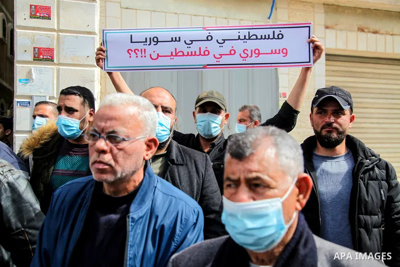 Refugees from Palestine Syria Libya and Yemen, take part in a protest to demand their rights and provide job opportunities, in Gaza city, on March 7, 2021. Nearly one-third of the registered Palestine refugees, more than...