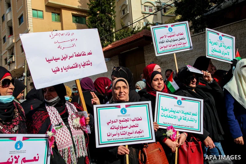 Palestinian women take part in a protest to solidarity with female prisoners in Israeli jails on the International Women's Day, in front of International Red Cross office in Gaza City, on March 8, 2021. Since the beginni...