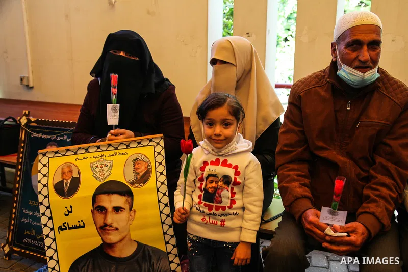 Palestinian women take part in a protest to solidarity with female prisoners in Israeli jails on the International Women's Day, in front of International Red Cross office in Gaza City, on March 8, 2021. Since the beginni...