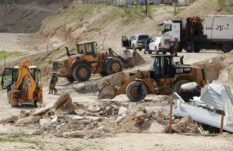 Israeli machinery demolish a Palestinian house, at Al Dyuk area, west of Jericho in the occupied West Bank on March 8, 2021. Over 60 per cent of the West Bank is considered Area C, where Israel retains near exclusive con...