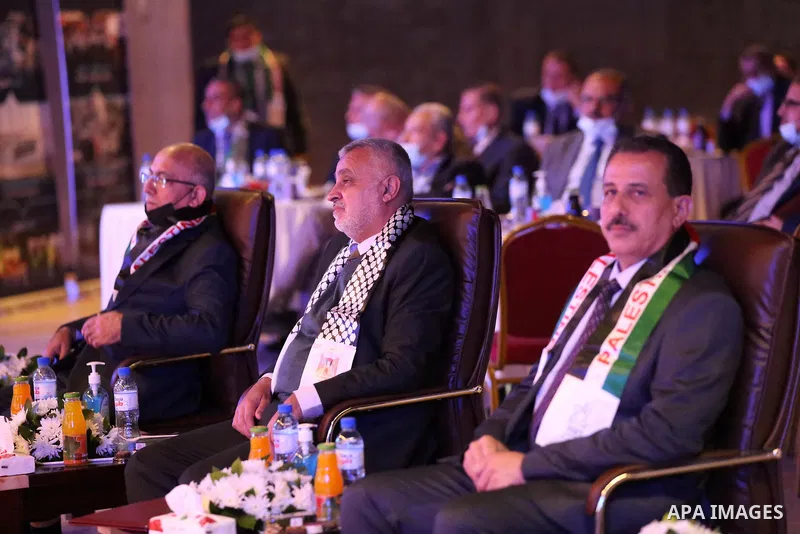 Mohammed Awad, head of the Governmental Follow-up Committee in the Gaza Strip, and Ahmed Abu Ras, Undersecretary of the Ministry of Local Government, attend the First Community Meeting 2021, in Gaza city of March 10, 202...
