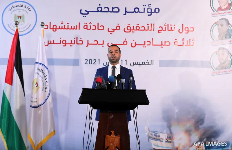 Eyad al-Bozm, the spokesman of the Palestinian Ministry of the Interior, speaks during a press conference, in Gaza city on March 11, 2021. The forensic report on the three fishermen found that they were killed by a sever...