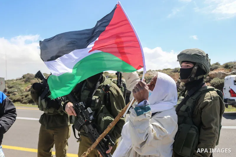 Palestinians and Israeli activists trying to block Route 60, the main Jewish settler road in the West Bank, as a protest against the confiscation of Palestinian land are dispersed by Israeli security forces near the vill...