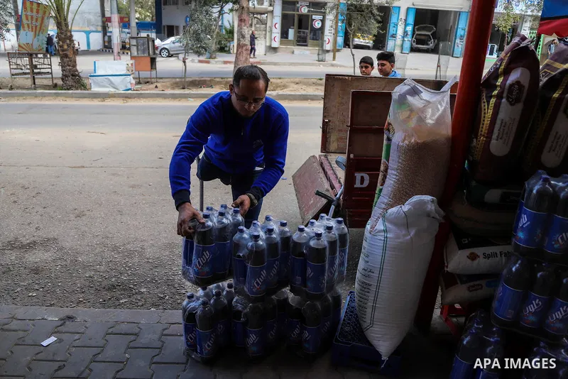 Palestinian Mohammed Totah with amputated leg, works to transport goods to shops, on the Palestinian Wounded's Day, in Gaza city, on March 13, 2021. Totah, 33 year-old, who had lost his leg and left eye, during the Israe...
