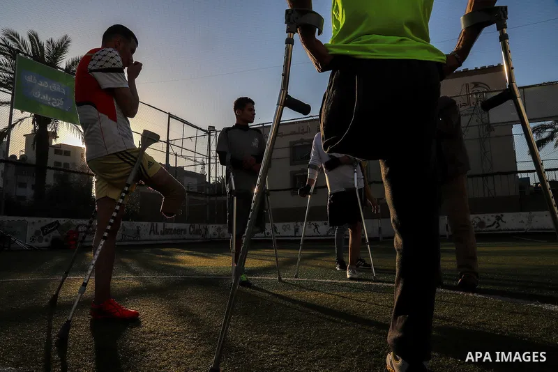 Disabled Palestinians who lost their legs by Israeli troops take part in the Football training on the Palestinian Wounded's Day, in Gaza city, on March 13, 2021. Al-Mezan Center for Human Rights said that more than (250,...