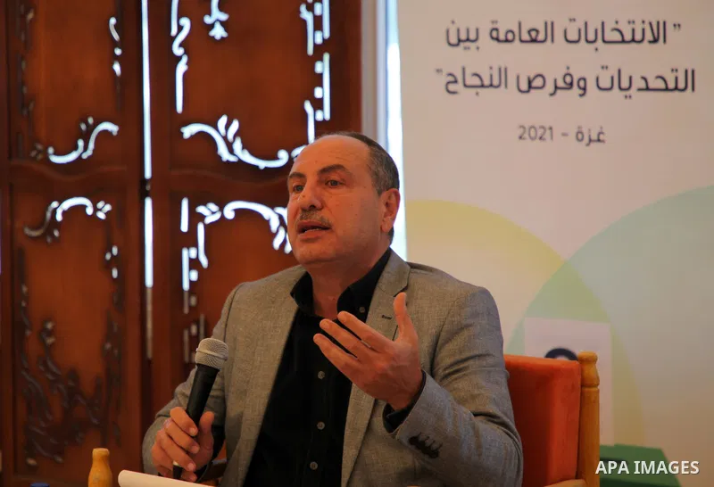 The head of Al Mezan Center for Human Rights, Issam Younis, speaks during a workshop, in Gaza city, on March 17, 2021. The Palestinian factions, which included the rival Fatah and Hamas movements, pledged not to incite “...