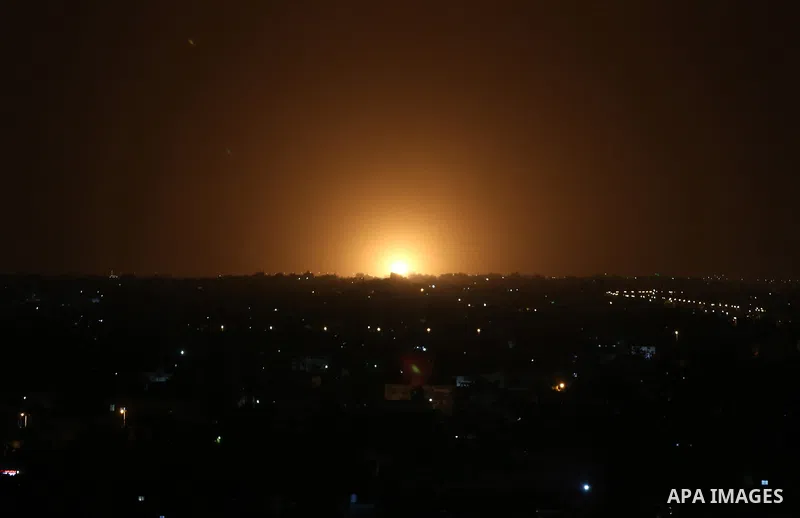 Smoke rises following an Israeli air strike in Deir al-Balah, central of Gaza Strip on March 24, 2021, after rocket were fired from the Gaza Strip. Photo by Ashraf Amra