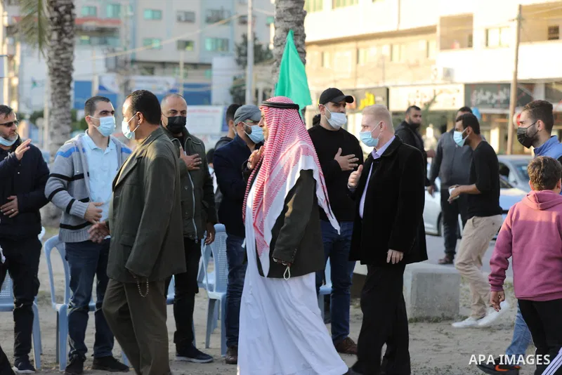 Palestinians attend the consolation of the liberated prisoner Omar Barghouti, who died of the coronavirus (COVID-19) pandemic, in Gaza city, on March 25, 2021. The United States will send $15 million to the Palestinians...