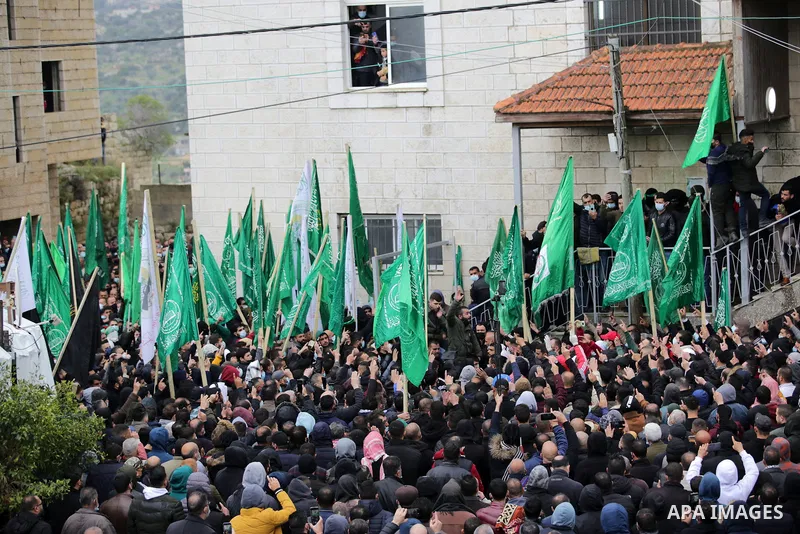 Palestinians attend the funeral of a founding committee member of the Palestinian Campaign for the Academic and Cultural Boycott of Israel (PACBI) and a co-founder of the Boycott, Divestment and Sanctions (BDS) movement,...