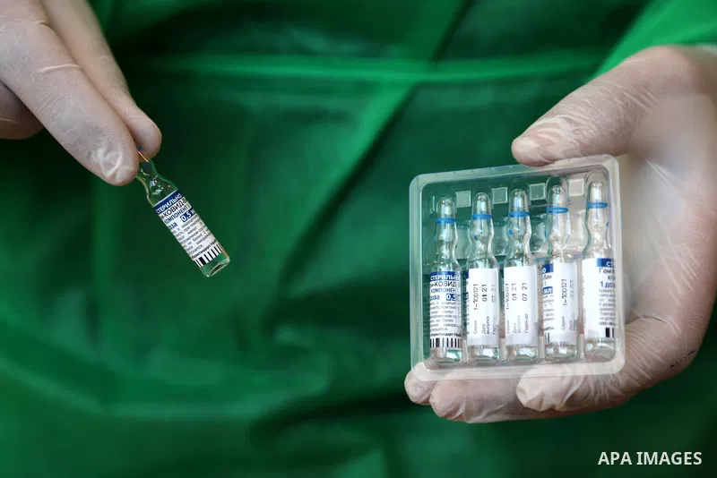 Palestinians receive the dose of the coronavirus disease (COVID-19) vaccine at the UNRWA clininc, in Gaza city on March 27, 2021. The Palestinian authorities have begun administering vaccines supplied under the internati...