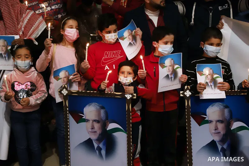 Palestinians from the al-Khudary family light candles during a protest to demand the release of their son D. Muhammad al-Khudari and his son Hani, who are imprisoned by the Saudi security, in Gaza City, on March 27, 2021...
