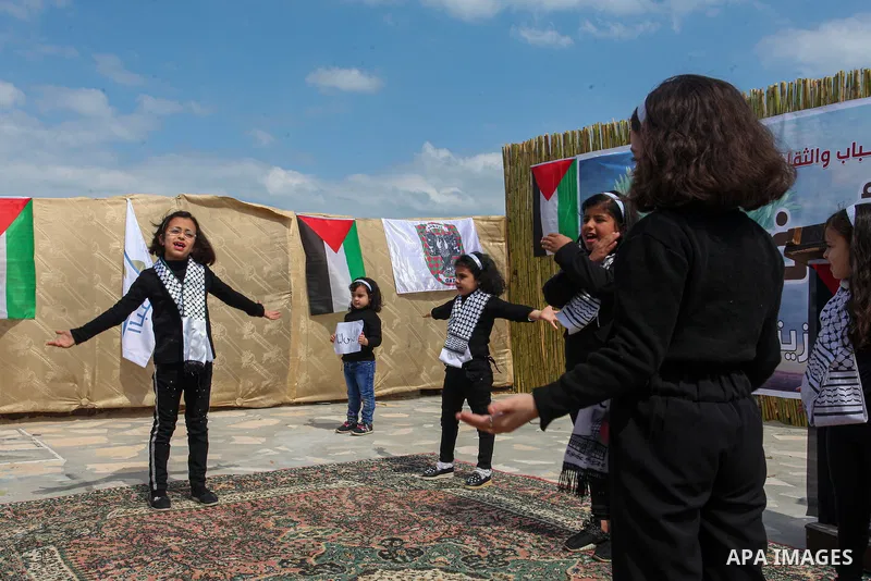 Palestinians take part in an event on March 30 the Land Day's annual demonstrations, in Gaza City on March 30, 2021. Palestinians every year mark Land Day on March 30 commemorating the six Palestinians shot and killed by...