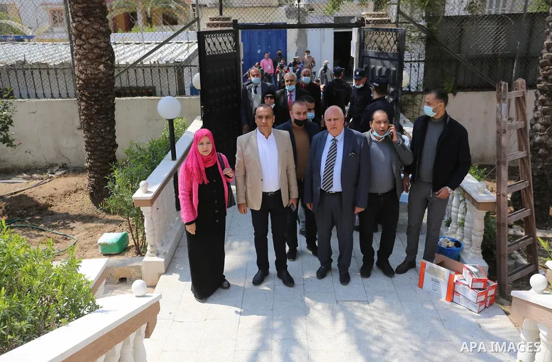 A delegation from the Independent Electoral List, headed by former PA prime minister Salam Fayyad, register party lists for parliamentary election, at the Central Elections Commission's office in Gaza City March 31, 2021...