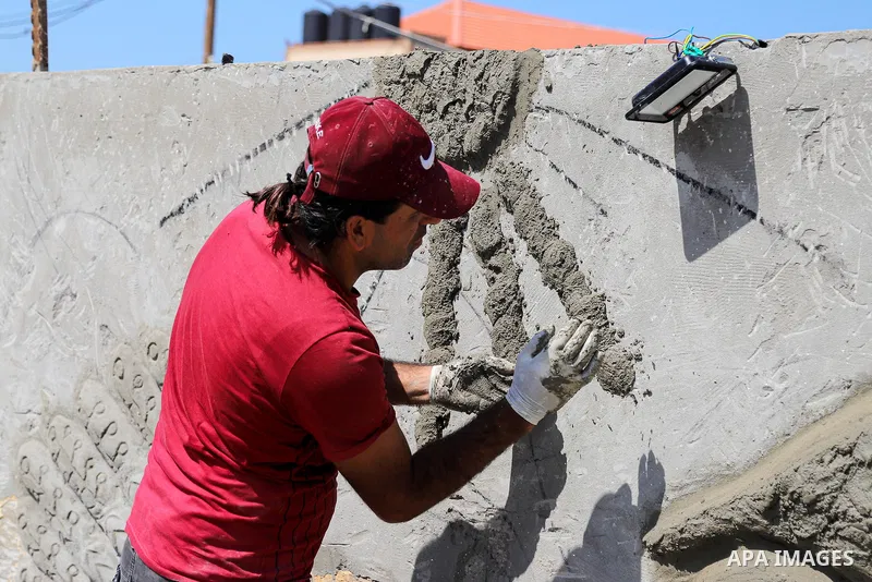 Palestinian plastic artist Youssef Nabhan, 37, puts the final touches on a cement sculpture, in Gaza City on April 1, 2021. As of 2019, there are three World Heritage Sites in Palestine, all them cultural sites. Palestin...