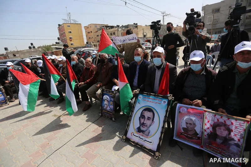 Palestinians take part in the press conference to announce the activities of the National Day of the Palestinian Prisoners' Day entitled (born free), in front of the house of the Palestinian Prisoner, Leader Hassan Salam...