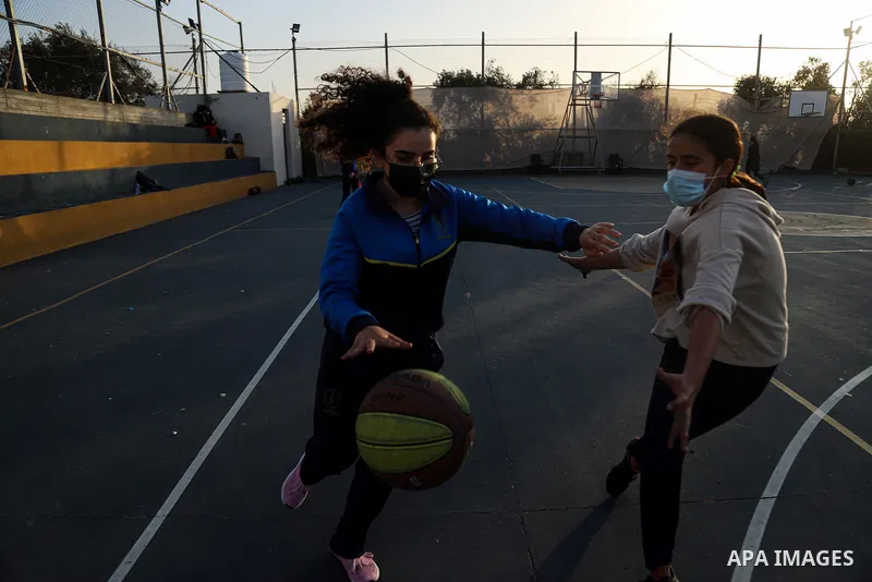 Palestinian girls play Basketball Sport, at Champions Club, on The International Day of Sport for Development and Peace, in Gaza city, on April 6, 2021. The International Day of Sport for Development and Peace on 6 April...