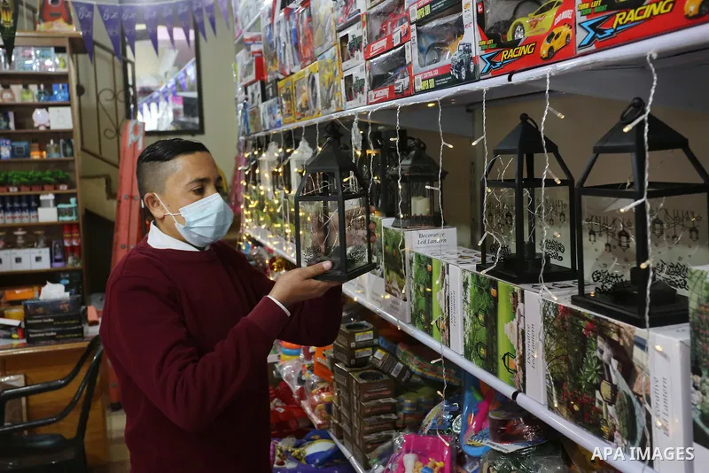 Palestinian men sell the Ramadan lanterns ahead the Muslim holy month of Ramadan, amid the coronavirus disease (COVID-19), in Deir al-Balah in the central Gaza Strip, on April 10, 2021. Celebrations in Gaza strip for Ram...