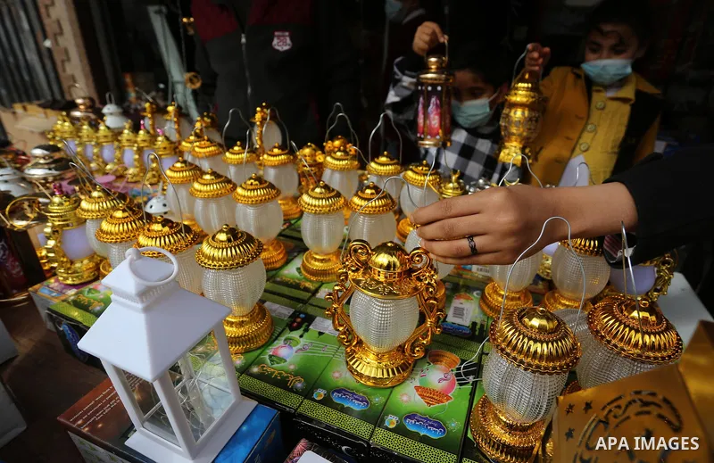 Palestinian men sell the Ramadan lanterns ahead the Muslim holy month of Ramadan, amid the coronavirus disease (COVID-19), in Deir al-Balah in the central Gaza Strip, on April 10, 2021. Celebrations in Gaza strip for Ram...