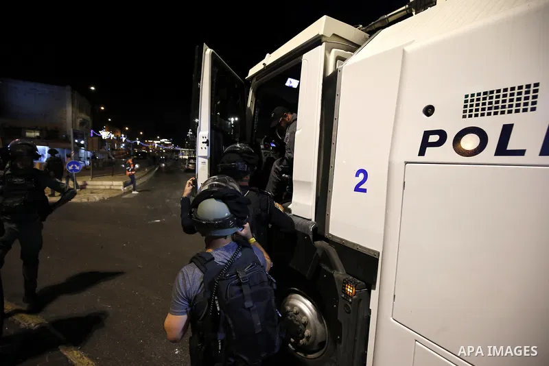 Israeli security forces detain a Palestinian man during clashes at Damascus Gate just outside Jerusalem's Old City, Thursday, April. 22, 2021. Palestinians clashed with Israeli police over restrictions on Ramadan gatheri...