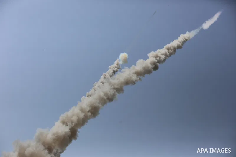 Rockets are fired toward the sea during a military drill by members of al-Mujahideen brigades, the military wing of al-Mujahideen movement, in Gaza city, on April 24, 2021. The attack maneuver focuses on a commander givi...