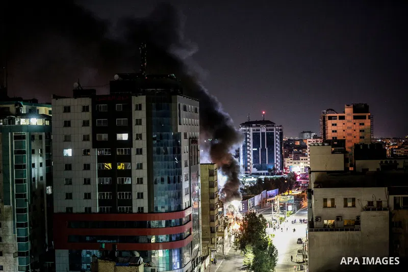Smoke is rising from burning tires during a rally in support of the Al-Aqsa Mosque during a rally in Gaza city on April 24, 2021, condemning overnight clashes in Israeli-annexed east Jerusalem. - Israeli police scuffled...