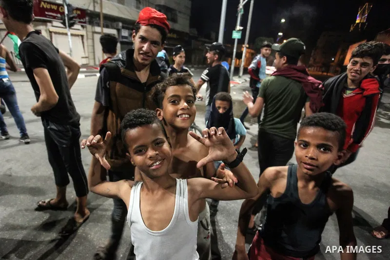 Palestinians take part during a rally in support of at the Al-Aqsa Mosque in Gaza City, on April 24, 2021. Raged last night in occupied Jerusalem for the 11th night in a row in protest against Israeli police and settlers...