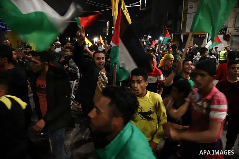 Palestinians take part during a rally in support of at the Al-Aqsa Mosque in Gaza City, on April 24, 2021. Raged last night in occupied Jerusalem for the 11th night in a row in protest against Israeli police and settlers...
