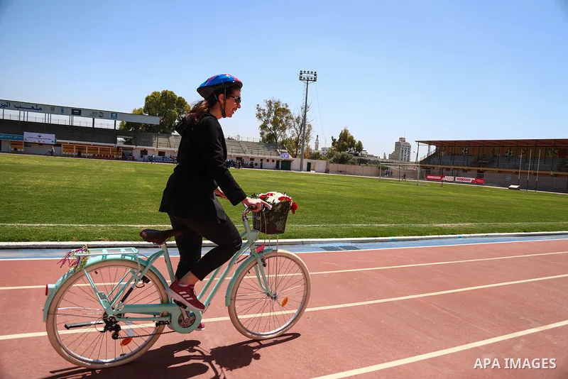 Palestinian women participate in cycling, "breathe deeply" at the Yarmouk stadium in Gaza City, on April 27, 2021. The "pink bike" project provides women and girls in the Gaza Strip the opportunity to ride bicycles in pr...