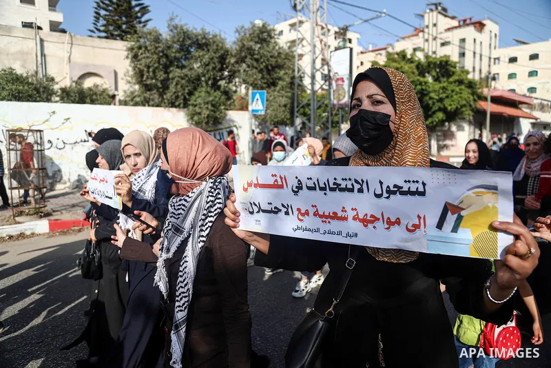 Supporters of Democratic Reformist Current take part in a protest against the possibility of cancelling the Palestinian elections in Gaza city on April 29, 2021. Palestinians are preparing for their first general electio...