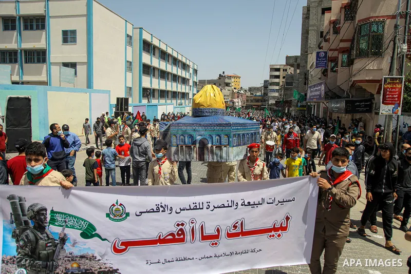 Palestinian supporters of Hamas movement demonstrate against postponement of the Palestinian parliamentary and presidential elections, calling for holding elections on planned date in Jabalia in the nothern Gaza Strip on...