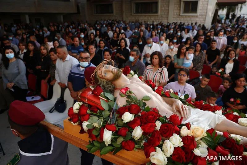 Palestinian Christians attend the "Good Friday" celebrations in the West Bank city of Jenin on April 30, 2021. Christian denominations around the world celebrate "Good Friday" as the remembrance of the day on which the P...