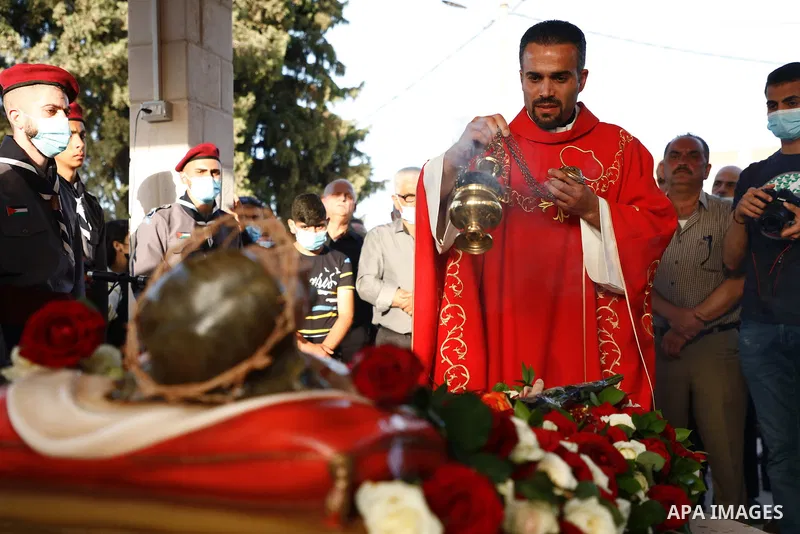 Palestinian Christians attend the "Good Friday" celebrations in the West Bank city of Jenin on April 30, 2021. Christian denominations around the world celebrate "Good Friday" as the remembrance of the day on which the P...