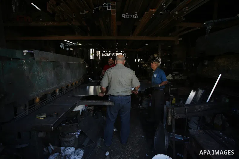 Palestinian blacksmith, works at blacksmith workshop, marking International Workers' Day, in the West Bank city of Nablus, on May 01. 2021. Youth (19- 29 years) are the most group suffering from unemployment. Thus, the u...