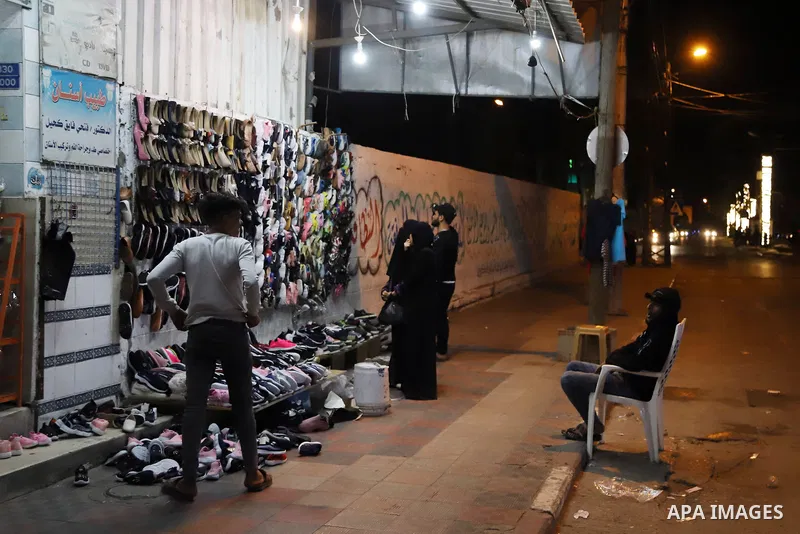 Palestinians shop at market days before Eid al Fitr in Gaza City amid the COVID-19 pandemic, after the decision of authorities in the Gaza Strip to eased tight precautionary measures to contain the COVID-19, on May 04, 2...