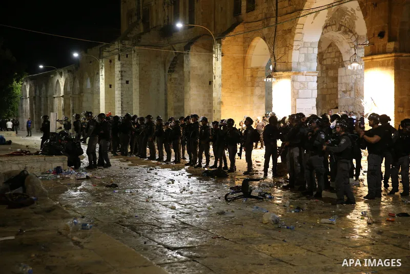 Israeli policemen gather during clashes with Palestinians at the compound that houses Al-Aqsa Mosque, known to Muslims as Noble Sanctuary and to Jews as Temple Mount, amid tension over the possible eviction of several Pa...