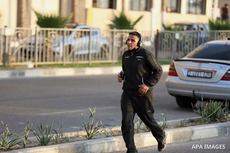 Palestinians walk after a lockdown due to the coronavirus was lifted, during the Muslim holy month of Ramadan, at the beach in the Gaza city, on May 8, 2021. COVID-19 has claimed the lives of 13 people in Palestine in th...