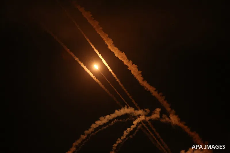 Rockets are launched from Gaza City, towards Israel early on May 16, 2021. Israel pummelled the Gaza Strip with air strikes, killing 10 members of an extended family and demolishing a building housing international media...