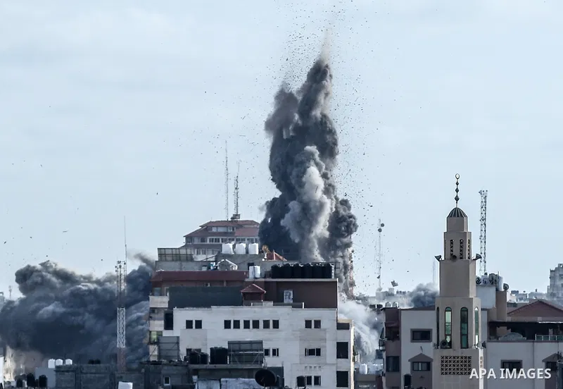 Smoke billows from a fire following an Israeli airstrike in Gaza City on May 17, 2021. Israel carried out early on Monday new heavy airstrikes in the Gaza Strip. ​At least 200 people in the besieged Palestinian enclave w...