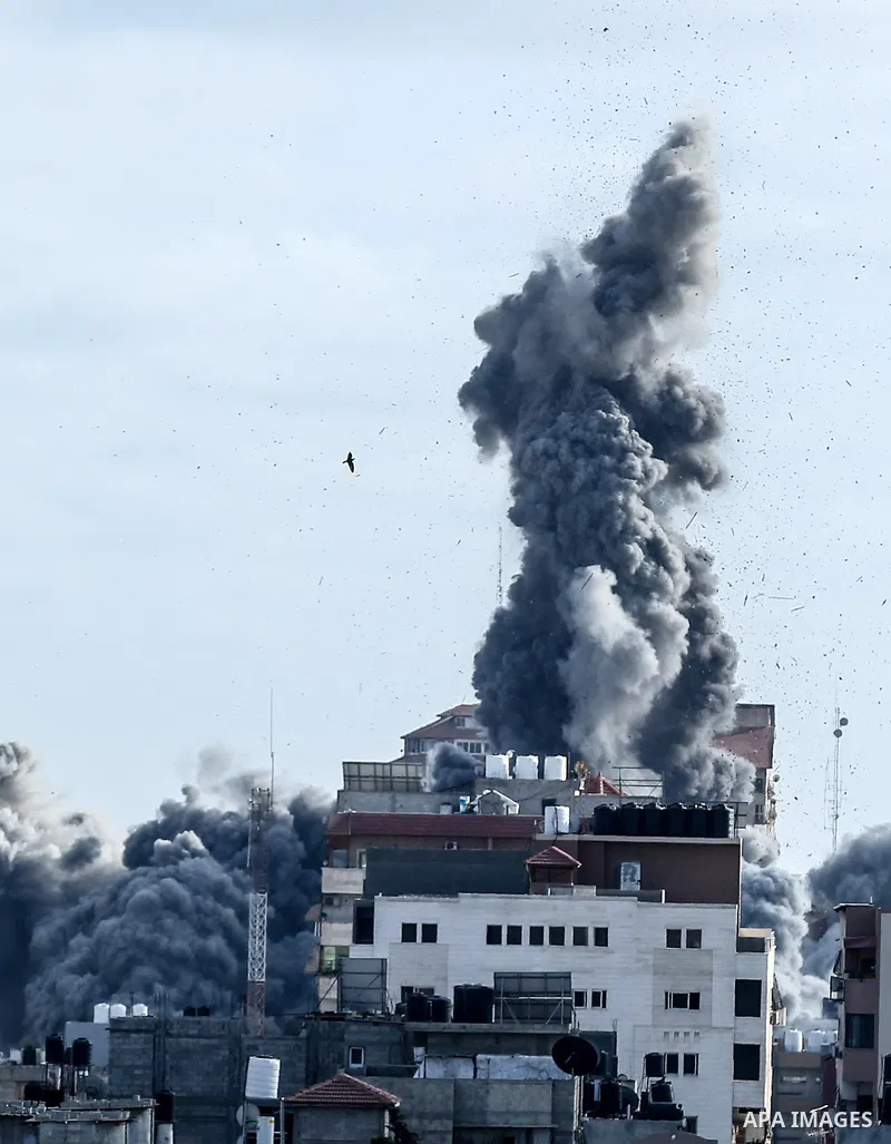 Smoke billows from a fire following an Israeli airstrike in Gaza City on May 17, 2021. Israel carried out early on Monday new heavy airstrikes in the Gaza Strip. ​At least 200 people in the besieged Palestinian enclave w...
