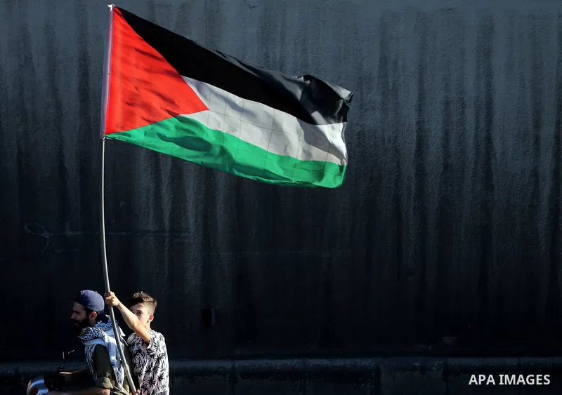 Lebanese wave Palestine flags during a rally in support of Palestinian, in Beirut, Lebanon, 18 May 2021. Heavy air strikes and rocket fire in the Israel-Gaza conflict claimed more lives on both sides as tensions flared i...