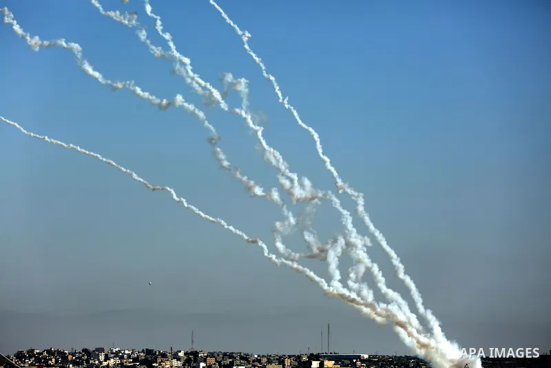 Rockets are launched from Gaza City, towards Israel on May 19, 2021. Deafening air strikes and rocket fire once more shook Gaza overnight and early Wednesday amid an international diplomatic push to broker a ceasefire af...