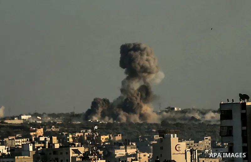 Smoke billows following an Israeli airstrike on Gaza City on May 19, 2021. Deafening air strikes and rocket fire once more shook Gaza overnight and early Wednesday amid an international diplomatic push to broker a ceasef...
