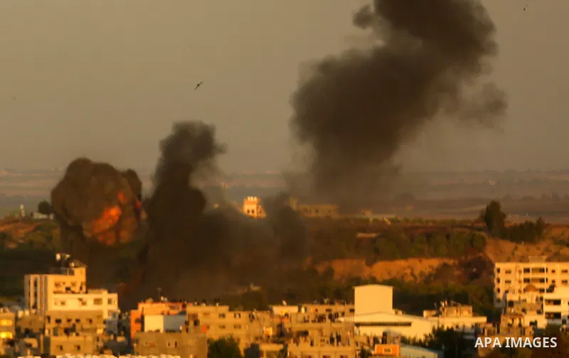 Smoke billows following an Israeli airstrike on Gaza City on May 19, 2021. Deafening air strikes and rocket fire once more shook Gaza overnight and early Wednesday amid an international diplomatic push to broker a ceasef...