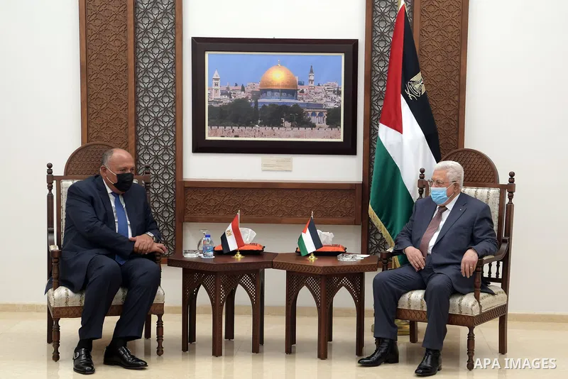 Palestinian President Mahmoud Abbas, meet with Egyptian Foreign Minister Sameh Shoukry in the West Bank city of Ramallah on May 24, 2021. Photo by Thaer Ganaim