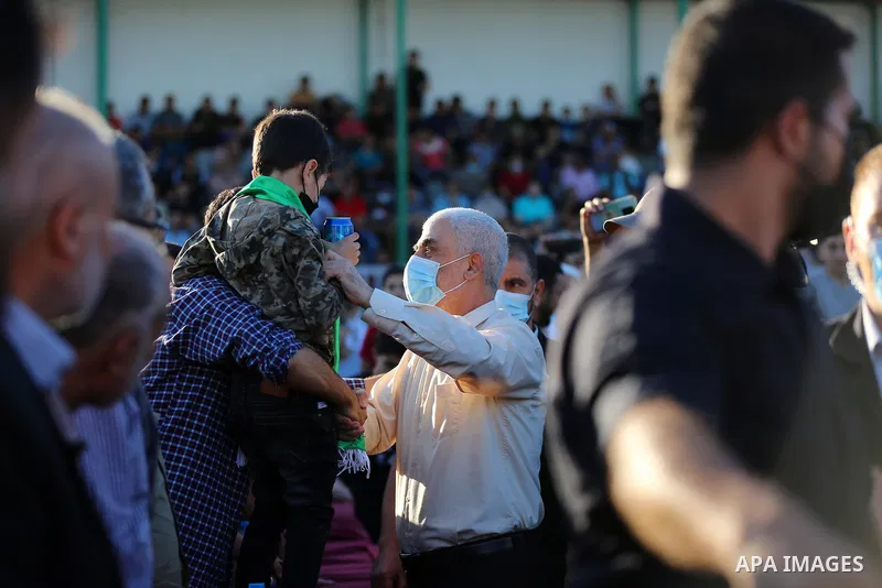 Yahya Sinwar, leader of the Palestinian Hamas movement, greets supporters during a rally in Gaza City on May 24, 2021. A ceasefire was reached late last week after 11 days of deadly violence between Israel and the Hamas...