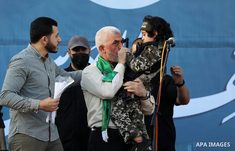 Yahya Sinwar, leader of the Palestinian Hamas movement, greets supporters during a rally in Gaza City on May 24, 2021. A ceasefire was reached late last week after 11 days of deadly violence between Israel and the Hamas...
