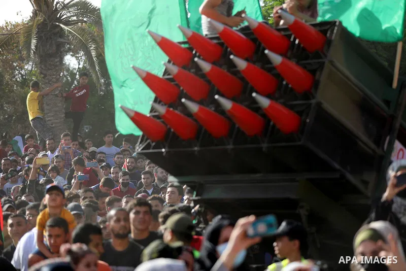 Palestinian Hamas supporters attend an anti-Israel rally in Beit Lahia in the northern Gaza Strip, May 30, 2021. Photo by Ashraf Amra