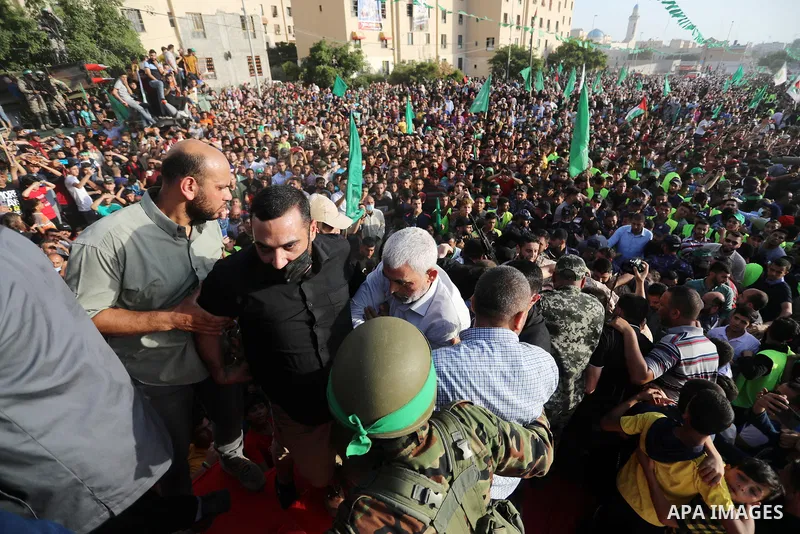 Yahya Sinwar, leader of the Palestinian Hamas movement's political wing, greets supporters in an anti-Israel rally in Beit Lahia in the northern Gaza Strip, May 30, 2021. Photo by Ashraf Amra